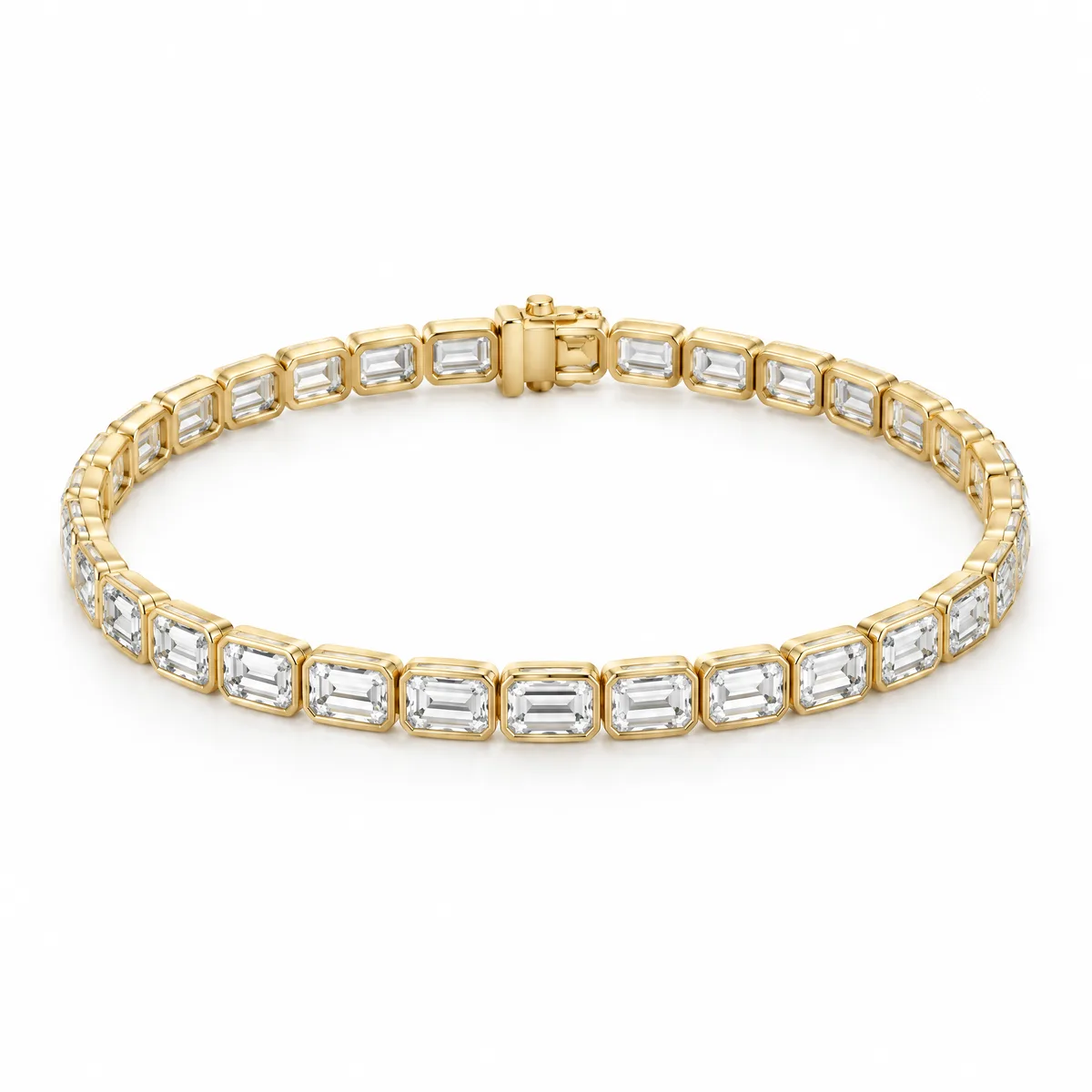 Emerald-cut tennis bracelet: Emerald-cut diamonds set east-west in slim 18k yellow gold bezels