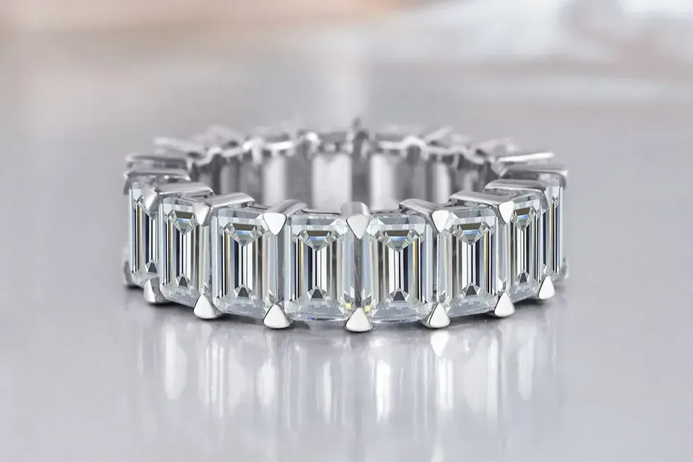 An emerald-cut lab-grown diamond eternity band