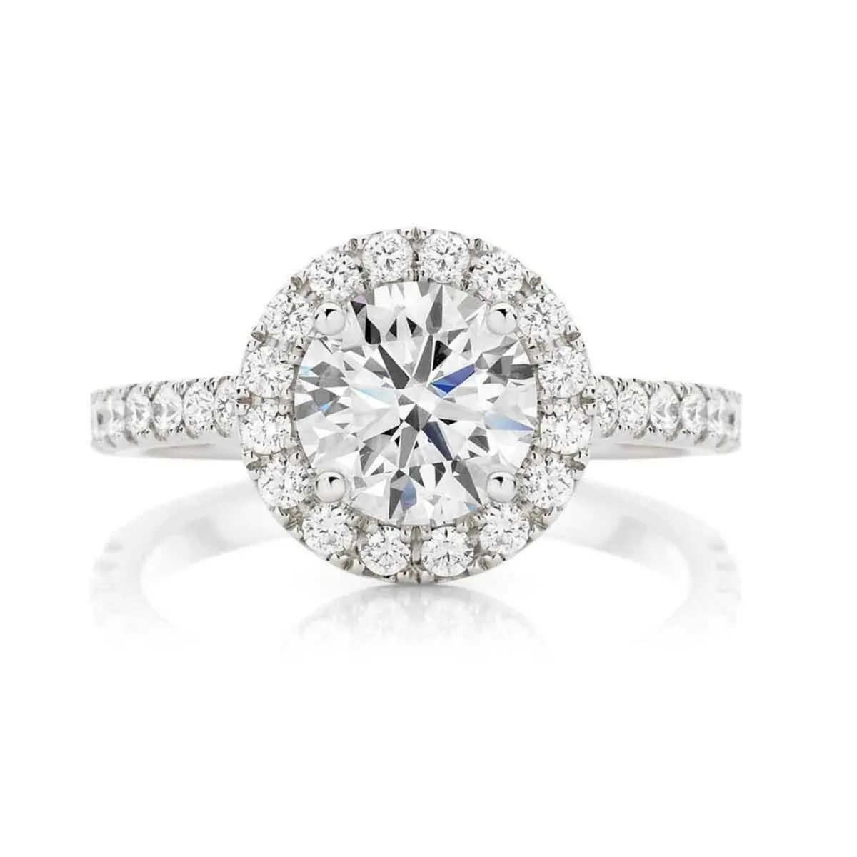 A round diamond halo engagement ring