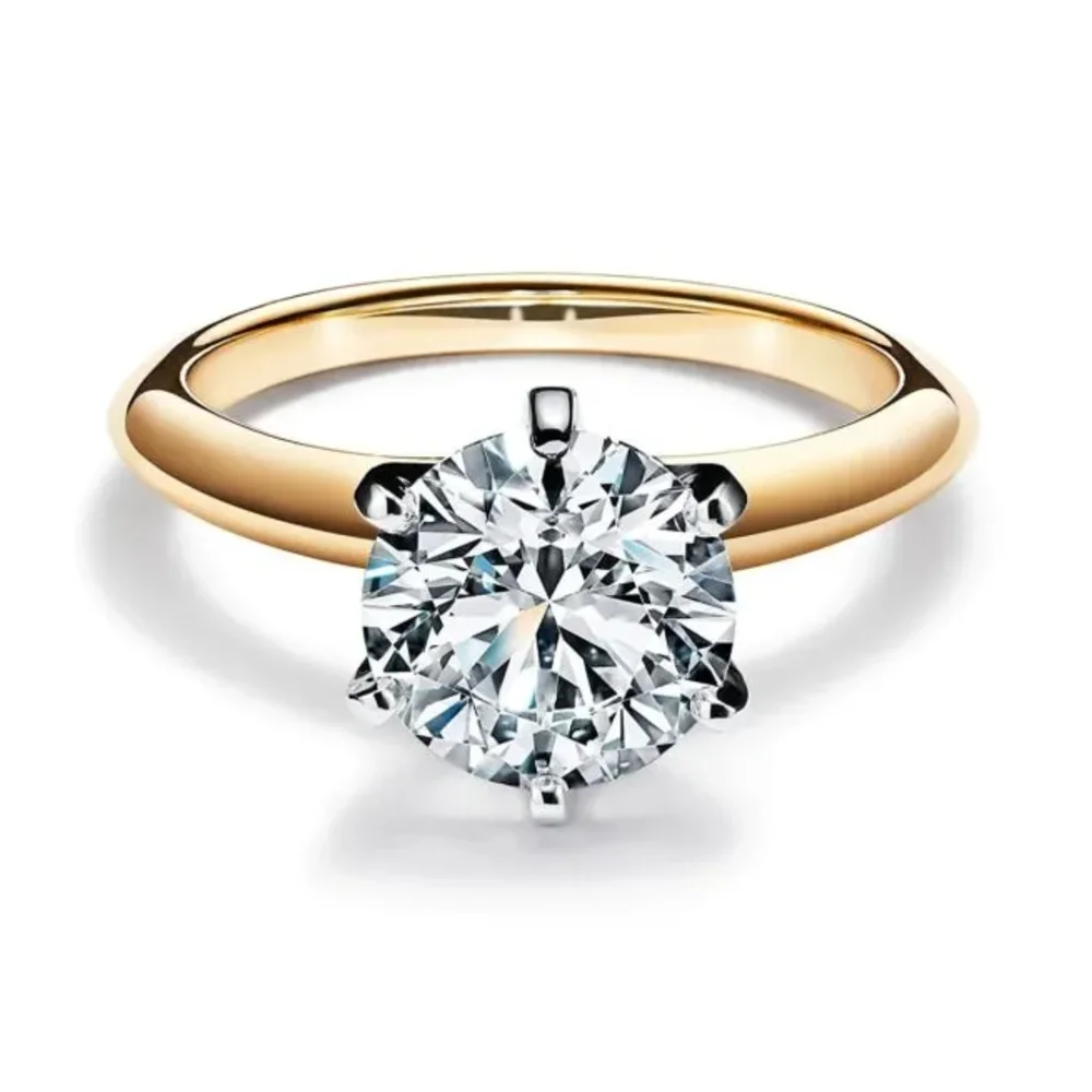 Timeless: Round diamond solitaire engagement ring set in 18ct yellow gold